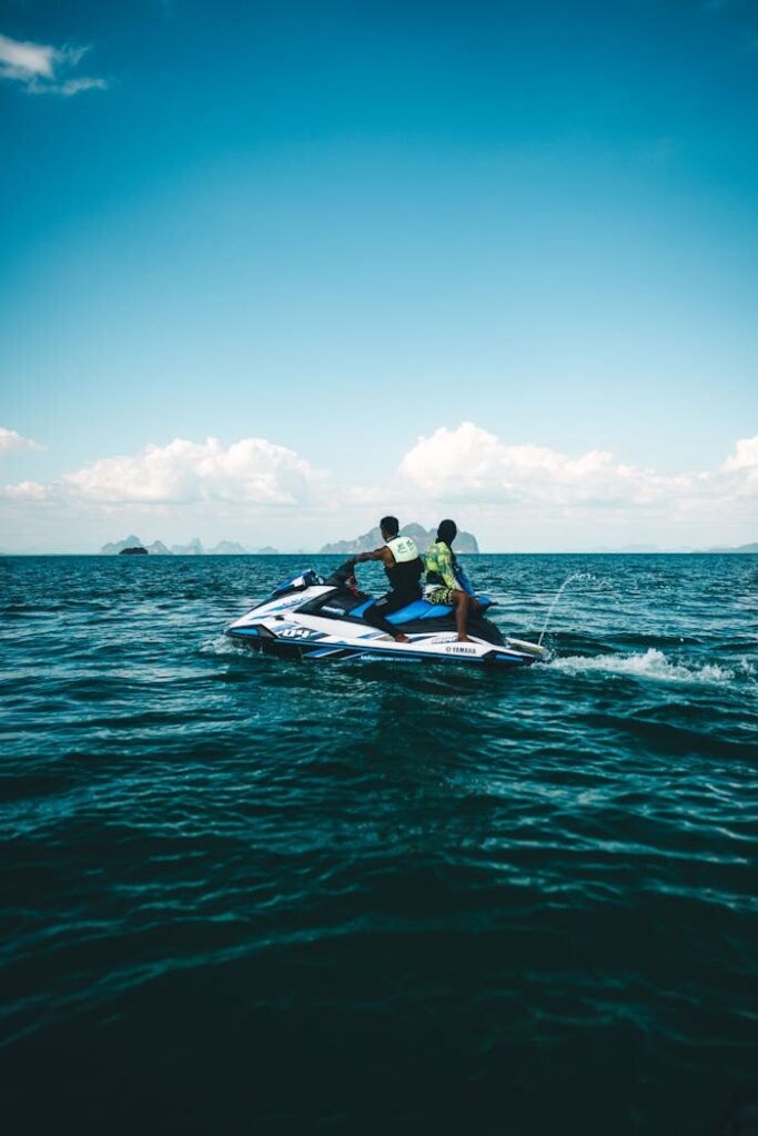 Experience an exhilarating jet ski ride over the crystal-clear waters of Phuket, Thailand.